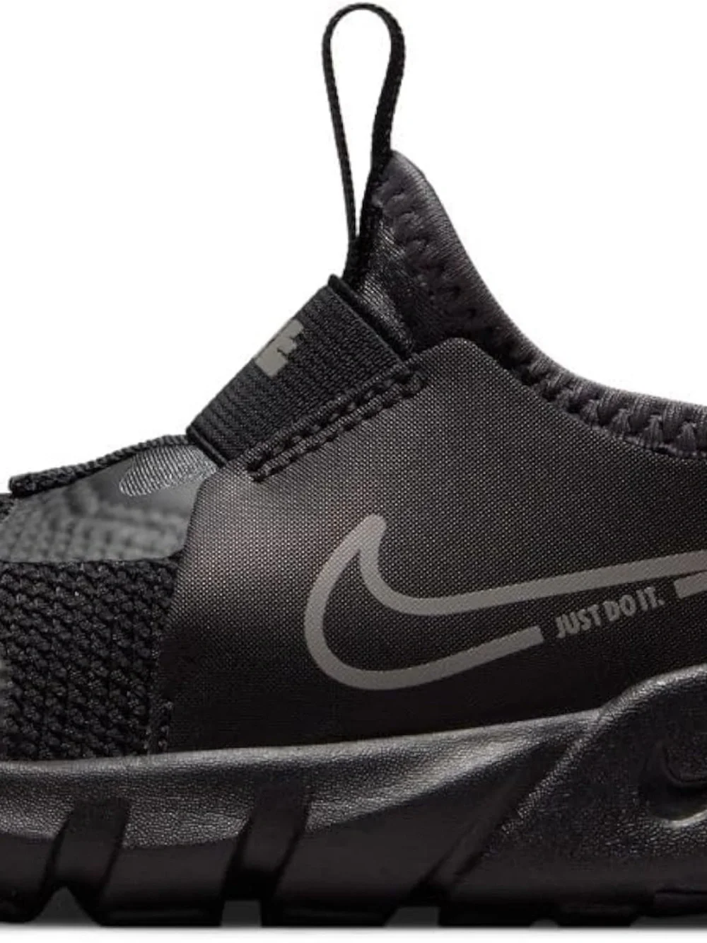 Nike Youth Black Slip-On Sneaker with White Swoosh and Blue Insole